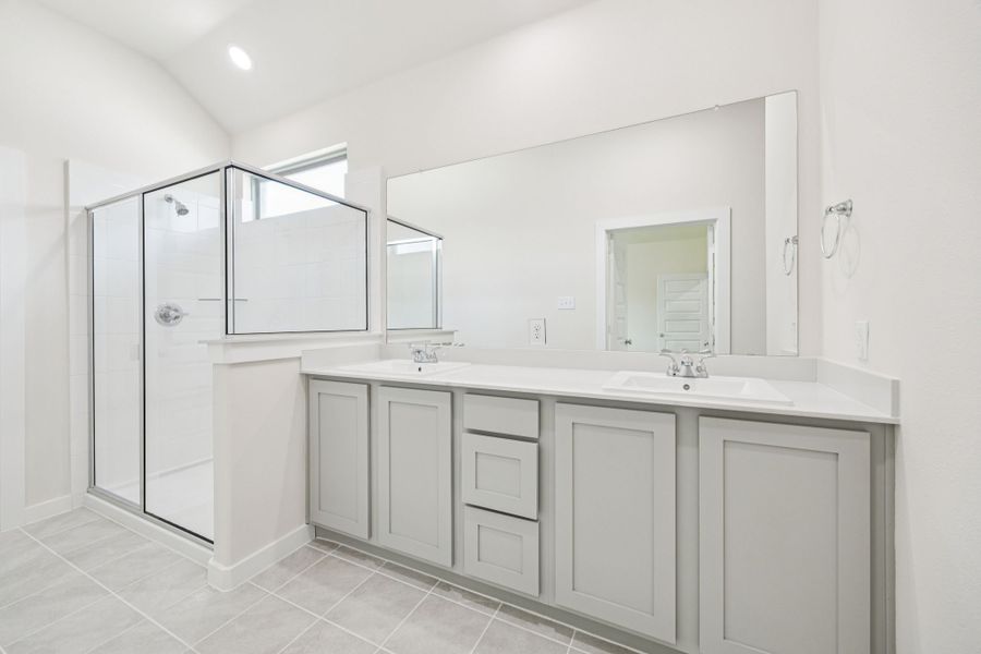 Primary Bathroom in the Claret home plan by Trophy Signature Homes – REPRESENTATIVE PHOTO Primary Bathroom in the Claret home plan by Trophy Signature Homes – REPRESENTATIVE PHOTO