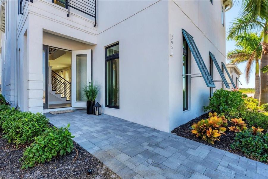 Exterior details and patio area of a home in Aqua Single Family Homes, Bradenton (Image 19).
