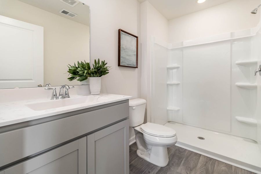 Representative furnished interior of a home built from the HELENA by D.R. Horton in Jordanville Farms, Galivants Ferry (Image 31).