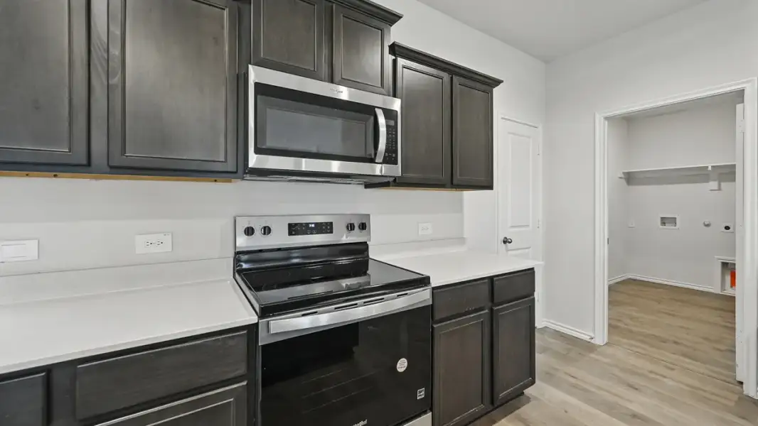 Furnished interior view inside a new home in Wildcat Ranch, Crandall (Image 7).