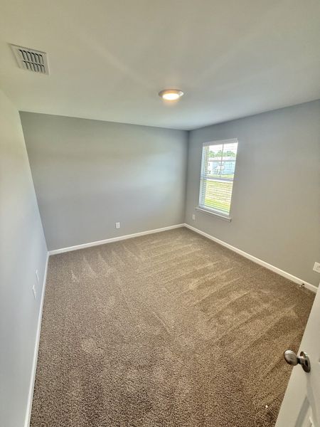 Spacious, unfurnished interior of a new home in Stone Fort Meadows, Manchester (Image 8).