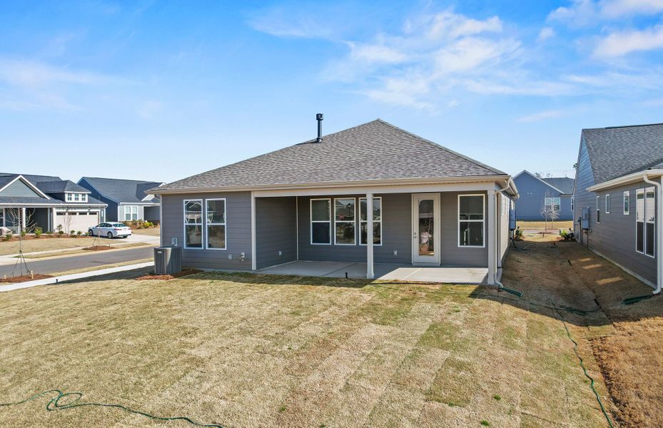Exterior details and patio area of a home in Carolina Riverside, Belmont (Image 27).
