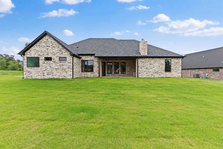 Exterior details and patio area of a home in , Tyler (Image 4).
