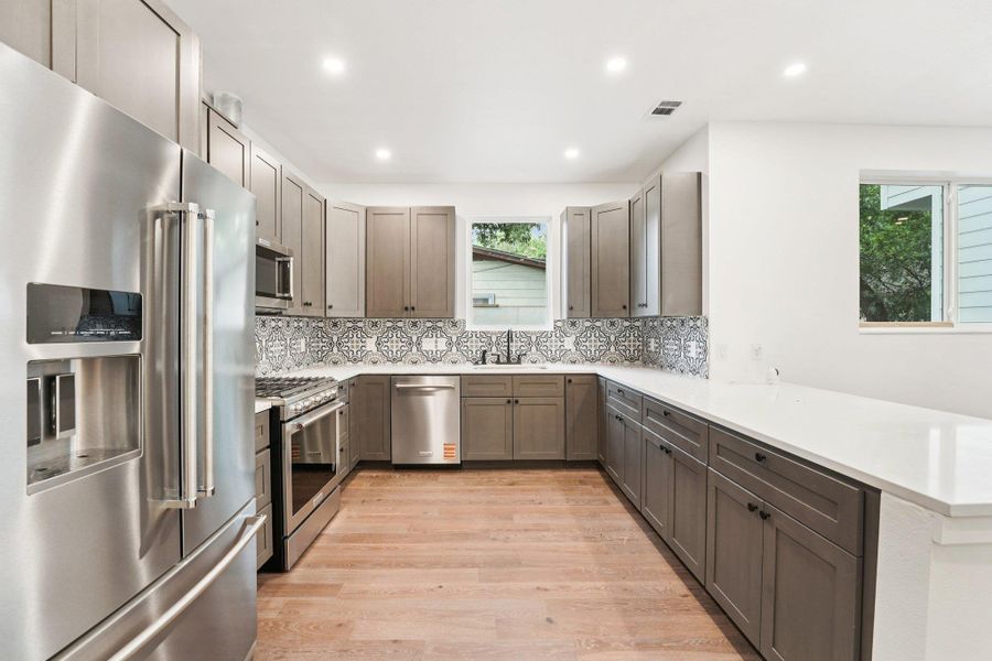 Kitchen with high end appliances, a Kitchen with high end appliances, a