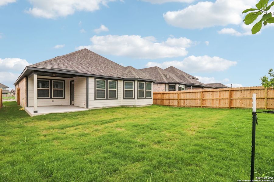Front exterior of a new home in Kallison Ranch, San Antonio, TX, highlighting curb appeal (Image 23). Front exterior of a new home in Kallison Ranch, San Antonio, TX, highlighting curb appeal (Image 23).