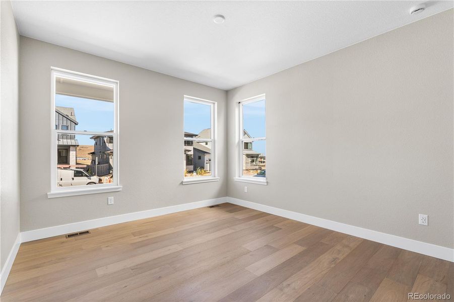 Spacious, unfurnished interior of a new home in Legends at Lyric, Lone Tree (Image 24).