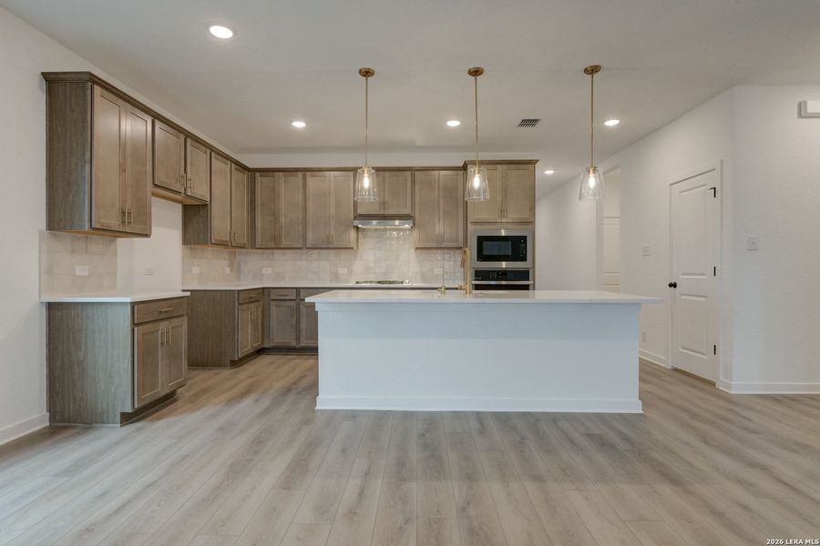 Furnished interior view inside a new home in Nopal Valley, San Antonio (Image 9).