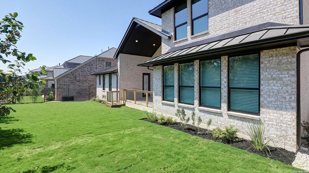 Exterior details and patio area of a home in The Dominion, San Antonio (Image 4).
