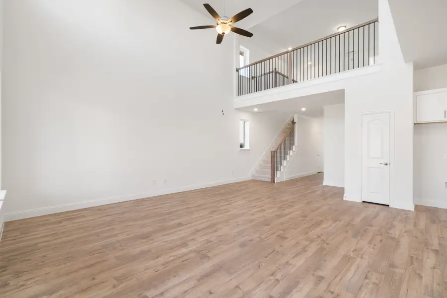 Spacious, unfurnished interior of a new home in Reunion, Rhome (Image 18).