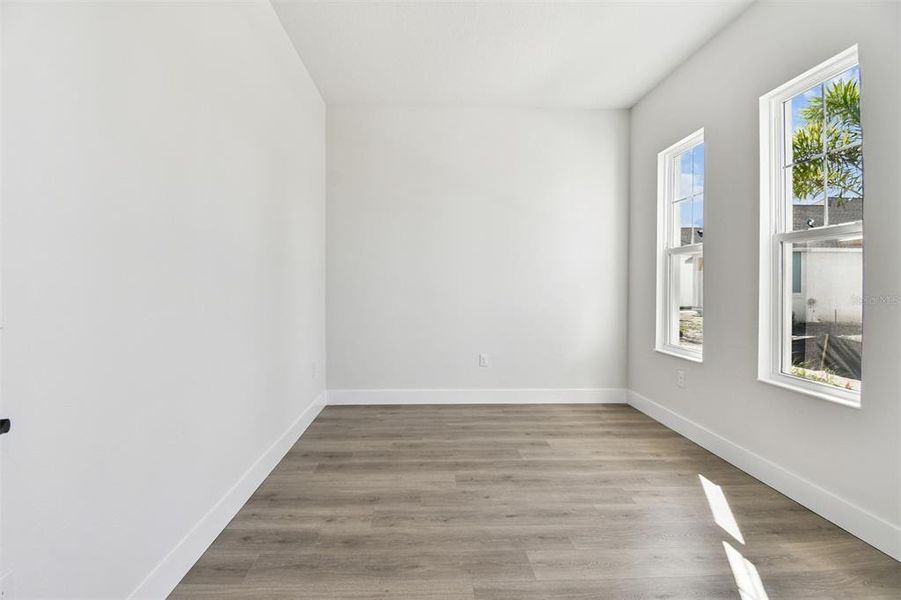 Spacious, unfurnished interior of a new home in Emerald Landing at Waterside at Lakewood Ranch – Cottage Series, Sarasota (Image 18).