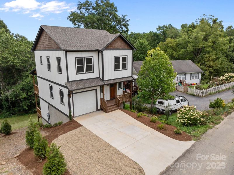 Front exterior of a new home in , Asheville, NC, highlighting curb appeal (Image 20).