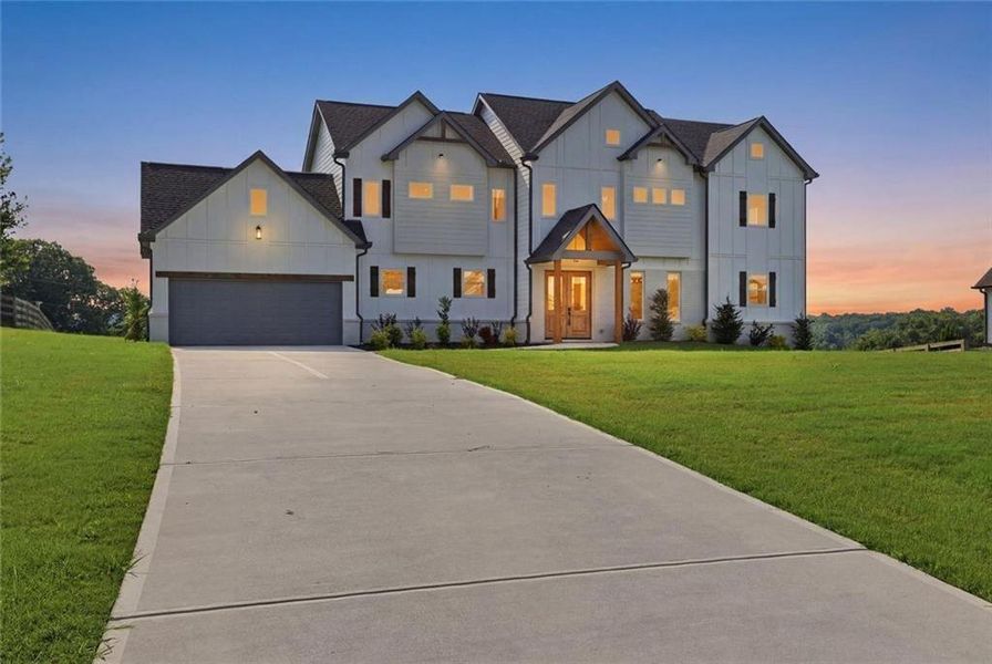 Front exterior of a new home in , Clermont, GA, highlighting curb appeal (Image 30).