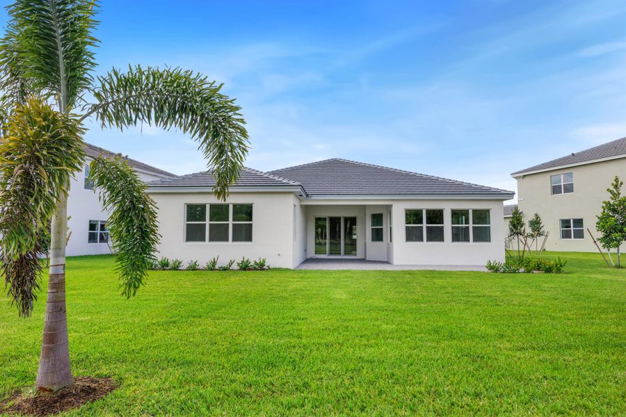 Front exterior of a new home in , Westlake, FL, highlighting curb appeal (Image 27). Front exterior of a new home in , Westlake, FL, highlighting curb appeal (Image 27).