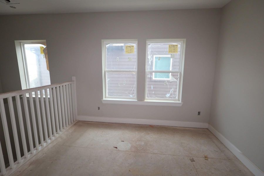 In-progress construction of a new home in Pomona - Grove Row Collection, Manvel, TX (Image 8).