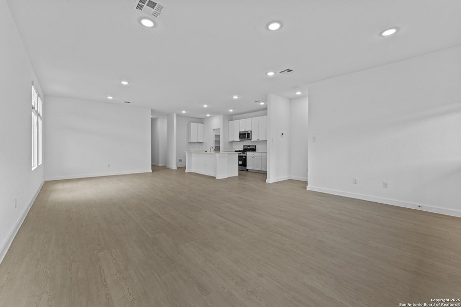 Spacious, unfurnished interior of a new home in Waterwheel: Coastline Collection, San Antonio (Image 23).