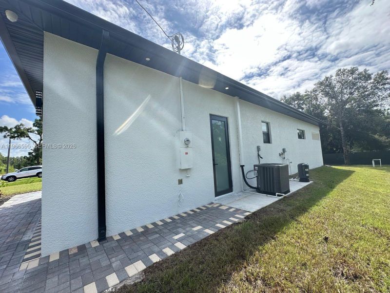 Exterior details and patio area of a home in , Lehigh Acres (Image 19).