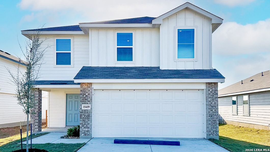 Front exterior of a new home in Preserve at Medina, Von Ormy, TX, highlighting curb appeal (Image 2). Front exterior of a new home in Preserve at Medina, Von Ormy, TX, highlighting curb appeal (Image 2).