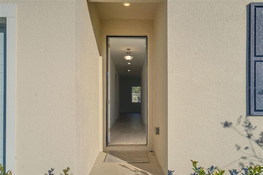 Exterior details and patio area of a home in Seaport Village, Tavares (Image 3).