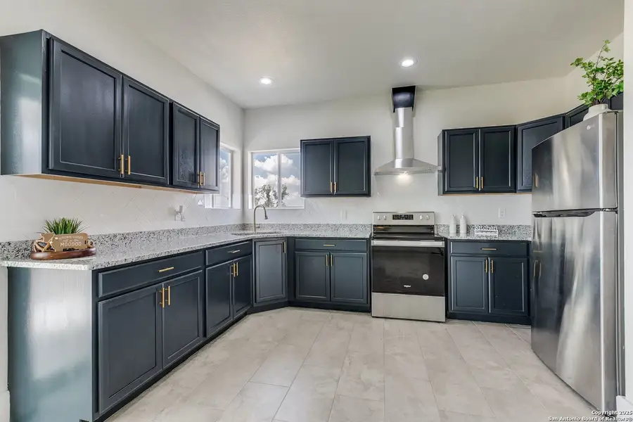 Furnished interior view inside a new home in , Atascosa (Image 11).
