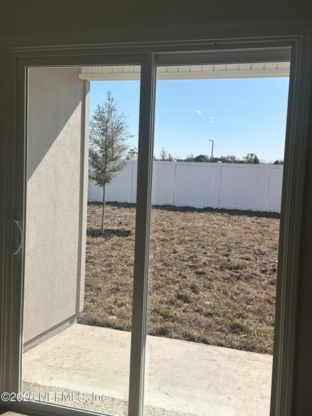 Exterior details and patio area of a home in Rookery, Green Cove Springs (Image 28).