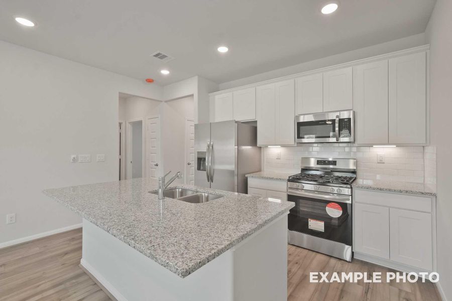 Furnished interior view inside a new home in Spring Branch Crossing, Conroe (Image 5).
