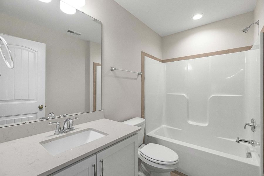 Representative furnished interior of a home built from the Clayton by Caviness & Cates Communities in Bartlett Manor, Youngsville (Image 225).