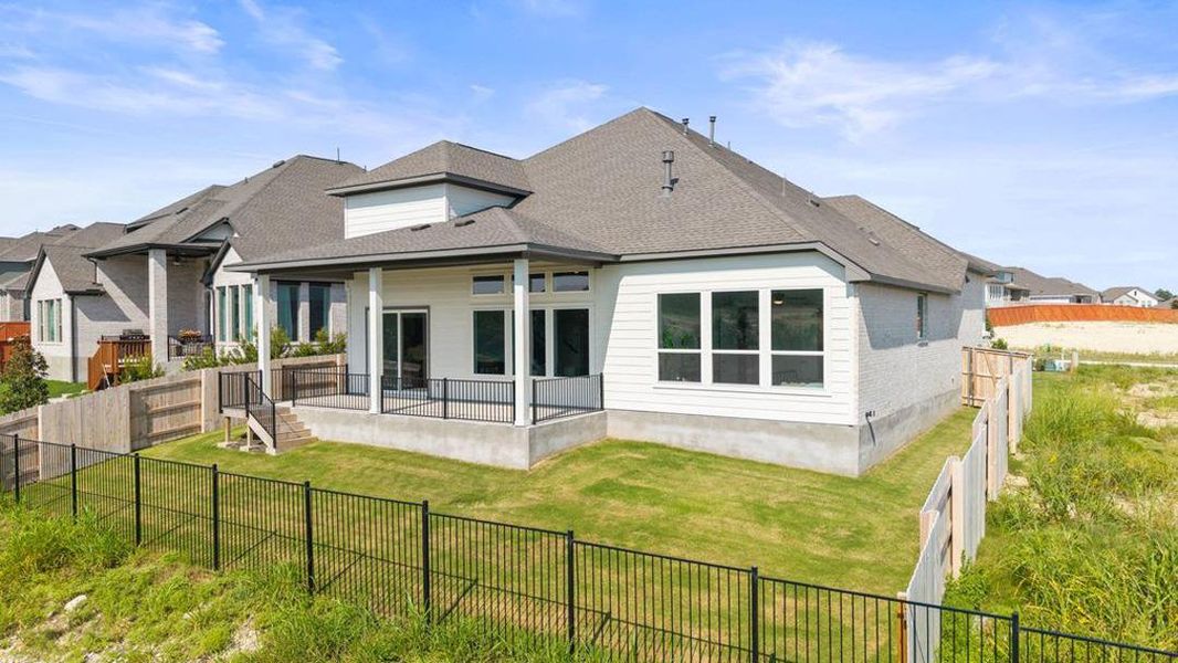 Exterior details and patio area of a home in Lariat, Liberty Hill (Image 24).