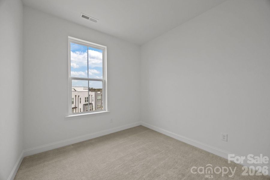 Spacious, unfurnished interior of a new home in The River District Townhomes, Charlotte (Image 30).