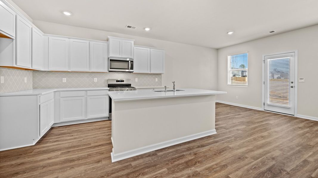 Representative furnished interior of a home built from the Saratoga by D.R. Horton in Poplar Preserve, Newnan (Image 5).