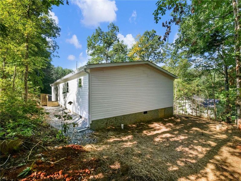 Exterior details and patio area of a home in , Clarkesville (Image 24).
