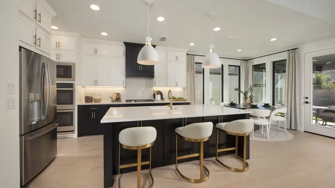 Representative furnished interior of a home built from the 3593W by Perry Homes in The Highlands, Porter (Image 10).