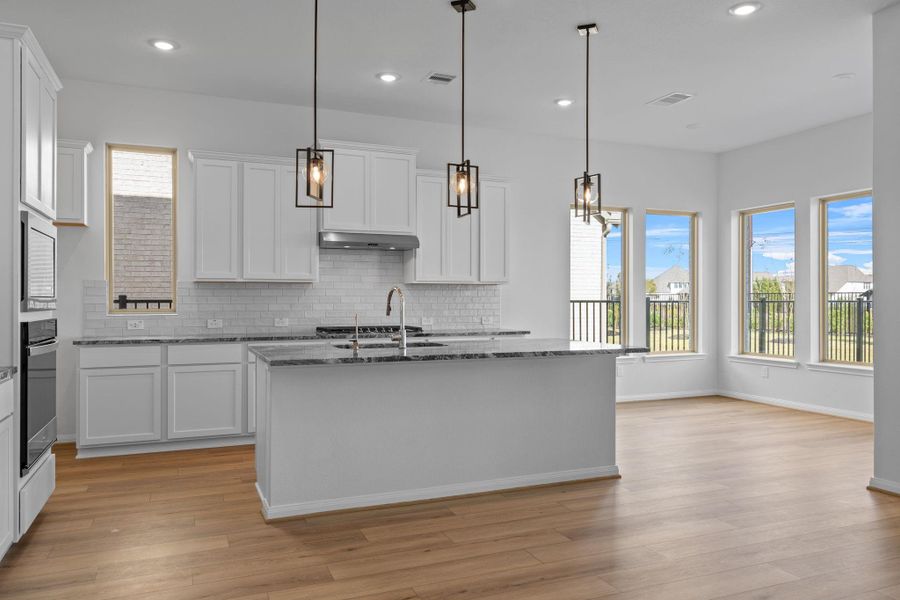 Furnished interior view inside a new home in Bridgeland 55', Cypress (Image 11).