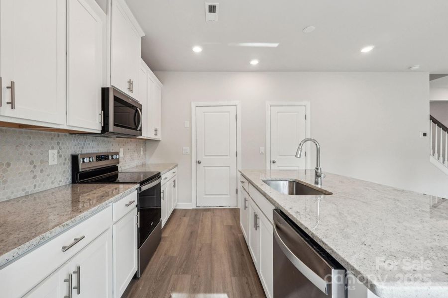 Furnished interior view inside a new home in Walnut Reserve, Conover (Image 2).