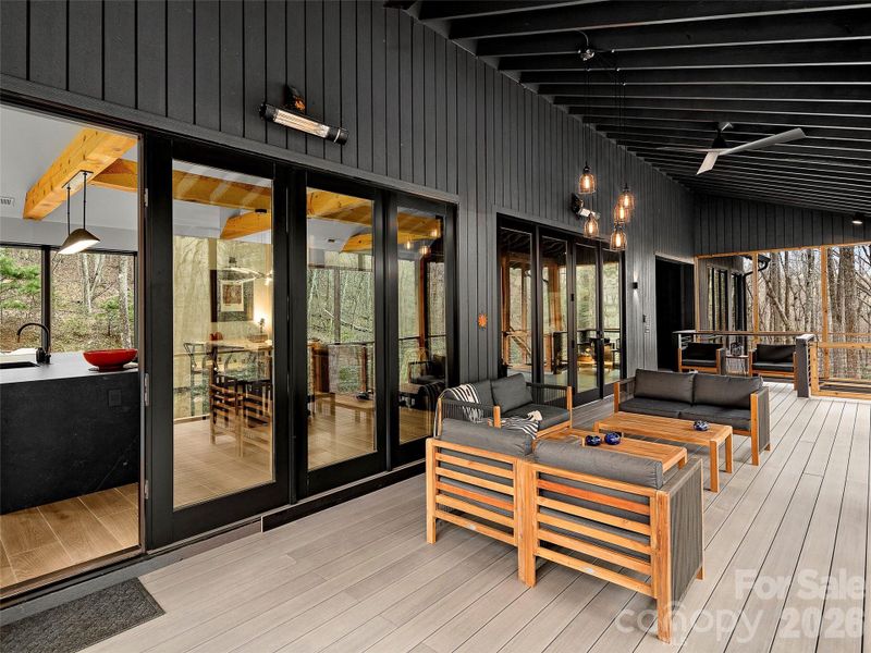 Screened in and heated upstairs deck Screened in and heated upstairs deck