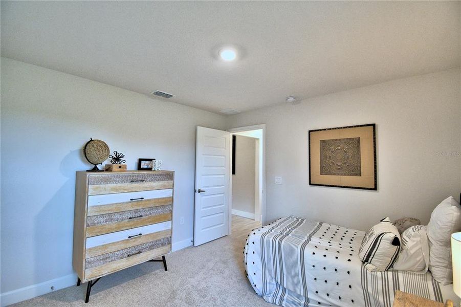 Furnished interior view inside a new home in Cadence Crossing, Auburndale (Image 29).