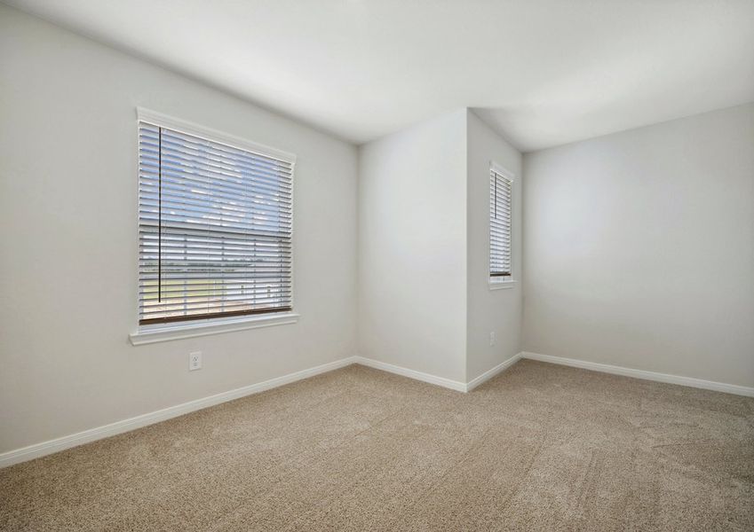 Spacious second bedroom with two windows
