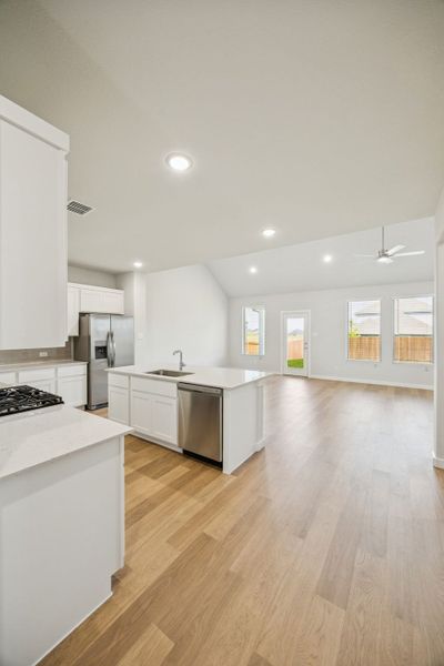 Open First Floor in the Masters home plan by Trophy Signature Homes – REPRESENTATIVE PHOTO