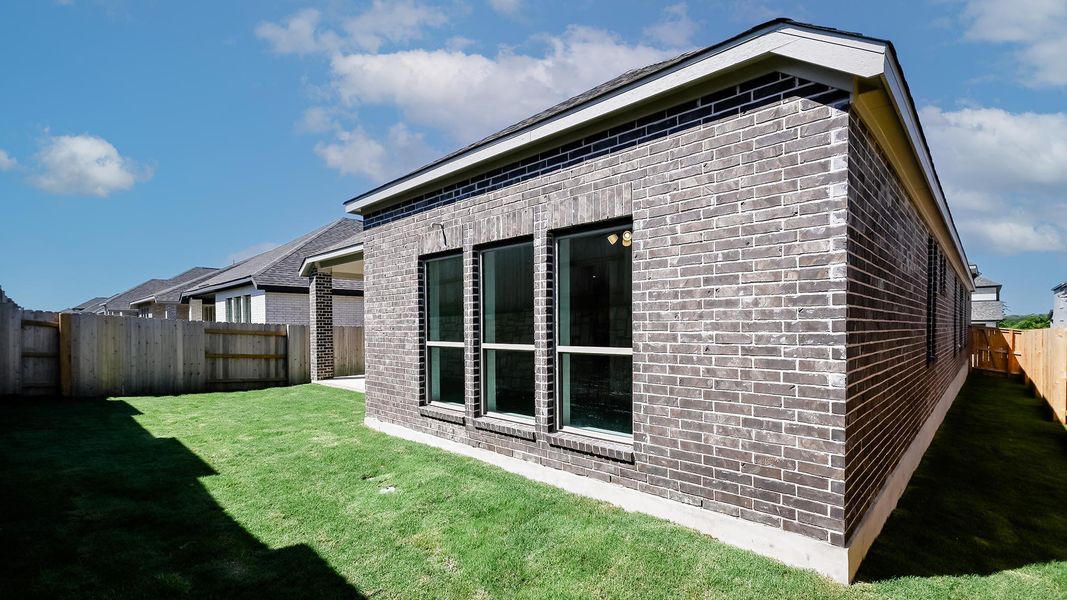 Exterior details and patio area of a home in Crosswinds, Kyle (Image 20). Exterior details and patio area of a home in Crosswinds, Kyle (Image 20).
