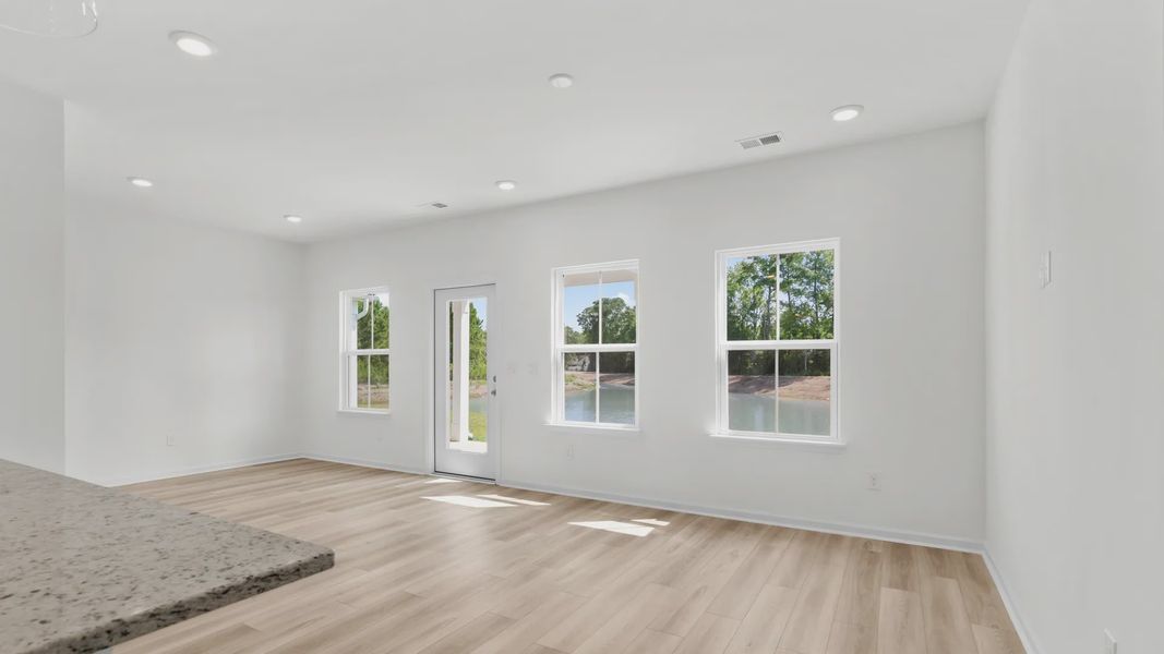 Furnished interior view inside a new home in Bluffs at Sun Colony, Longs (Image 6).