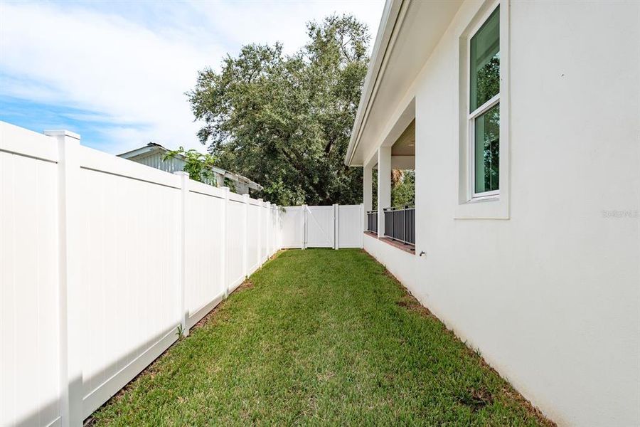 Front exterior of a new home in , Tarpon Springs, FL, highlighting curb appeal (Image 20).