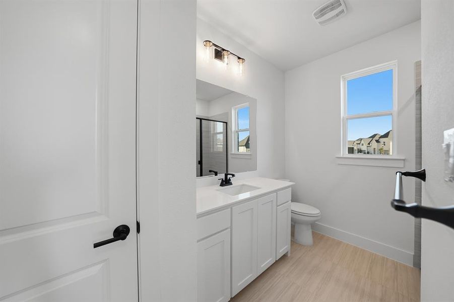 Furnished interior view inside a new home in Brookhollow West, Prosper (Image 13).
