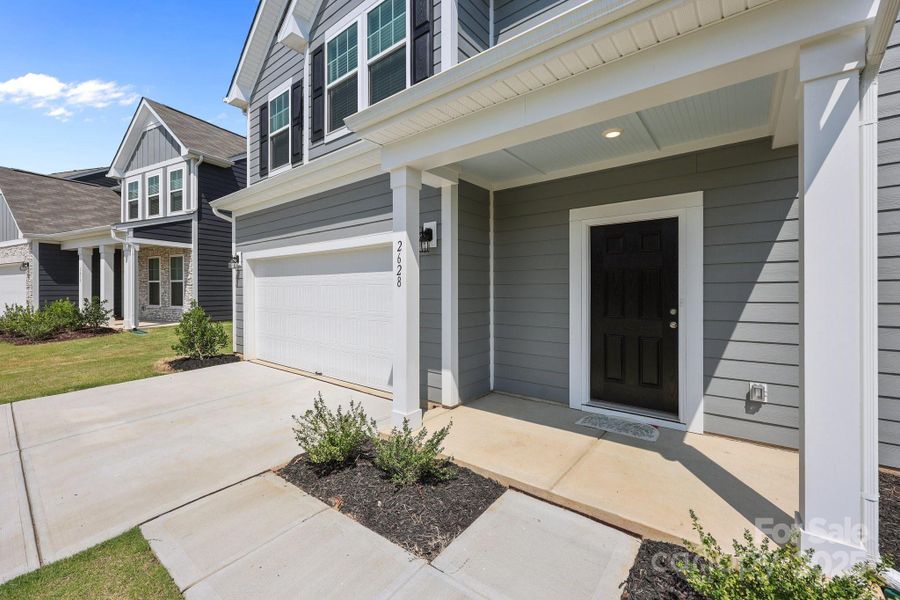 Front exterior of a new home in Piper Landing, Concord, NC, highlighting curb appeal (Image 23).
