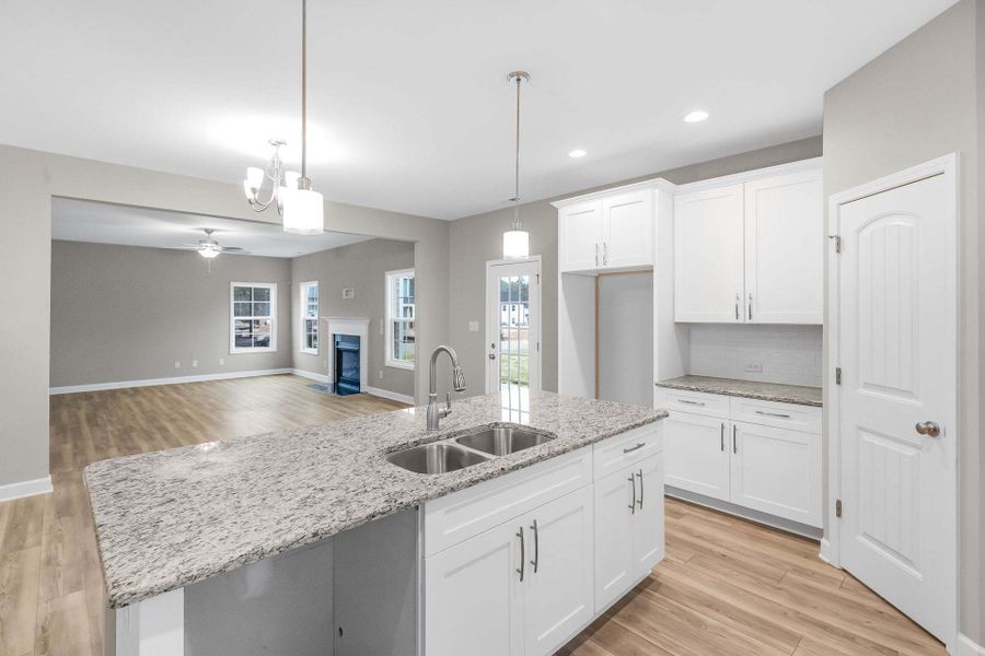 Representative furnished interior of a home built from the Aberdeen by Caviness & Cates Communities in Bartlett Manor, Youngsville (Image 142).