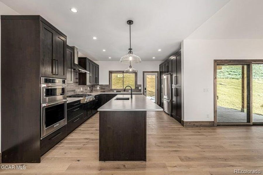 Furnished interior view inside a new home in , Granby (Image 6).