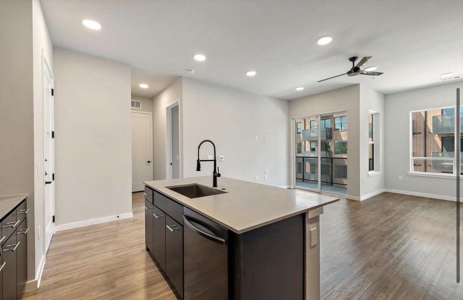 Clean lines and smooth flooring define this modern, open-concept living space. Clean lines and smooth flooring define this modern, open-concept living space.