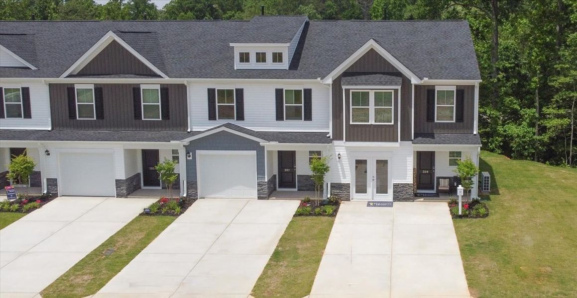 Front exterior of a new home in Meece, Easley, SC, highlighting curb appeal (Image 2).