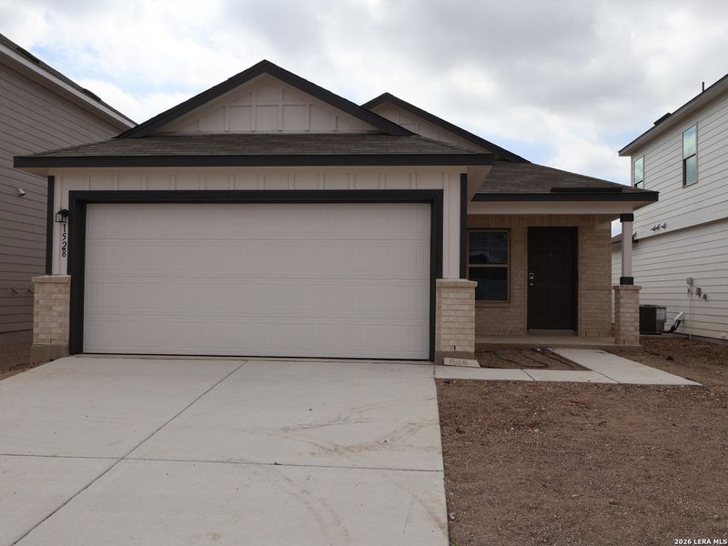 Front exterior of a new home in Meadows at Clear Springs, New Braunfels, TX, highlighting curb appeal (Image 20).