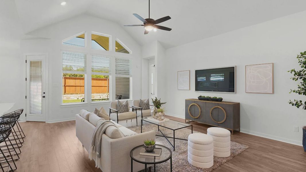 Representative furnished interior of a home built from the Brooks by Chesmar Homes in University Heights, Round Rock (Image 11).