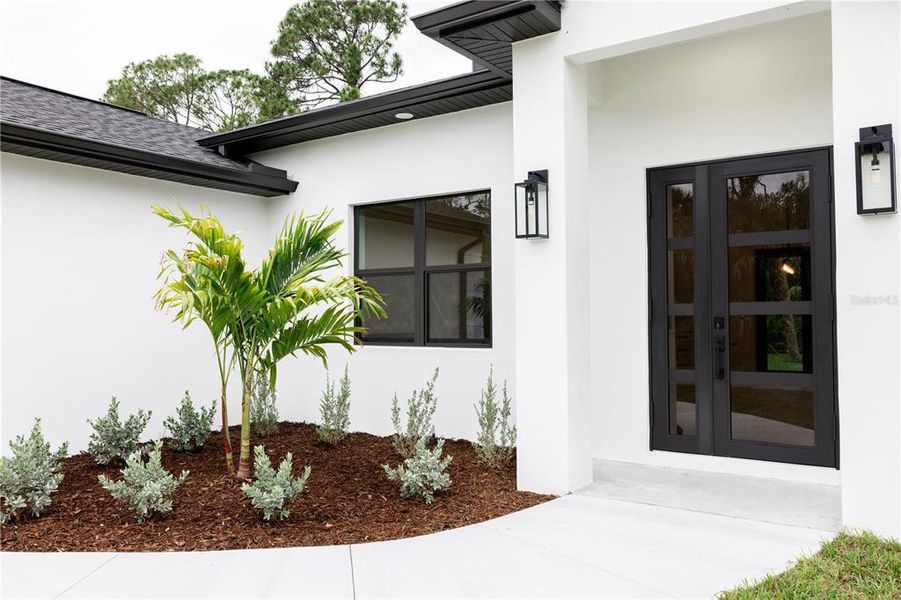Exterior details and patio area of a home in , North Port (Image 24).