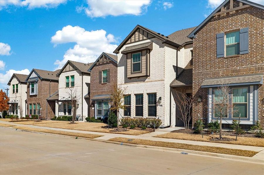 Front exterior of a new home in , Sachse, TX, highlighting curb appeal (Image 22).
